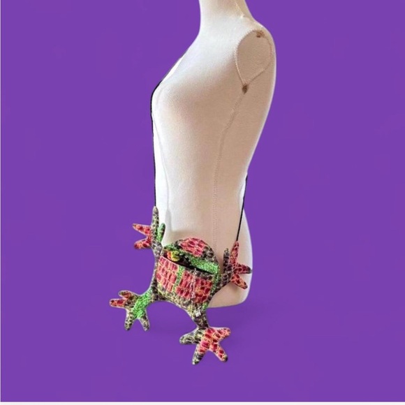 Assorted y2k items: frog purse, neon hair ties, and silver charm bracelets - Picture 6 of 7